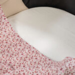 Set de Sábana bajera ajustable para capazo + muselina Cherry flores - Imagen 6